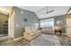 Spacious living area with vaulted ceiling, comfortable seating, and abundant natural light at 4802 51St W St # 1118, Bradenton, FL 34210