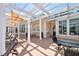 A shaded patio offers a communal outdoor seating area with tables and lounge chairs at 4802 51St W St # 1118, Bradenton, FL 34210