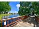 A serene view of the pond from a wooden boardwalk in this quiet community at 4802 51St W St # 1118, Bradenton, FL 34210