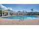 Resort-style pool with brick surround and shaded lounge areas at 4802 51St W St # 1118, Bradenton, FL 34210