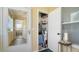 The condo unit has a small storage room or closet with ample storage space, next to a screened-in porch at 4802 51St W St # 1118, Bradenton, FL 34210