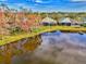 Aerial view of home and private backyard lake access at 4914 Lakescene Pl, Sarasota, FL 34243