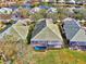 Aerial view of community pool and surrounding villas at 4914 Lakescene Pl, Sarasota, FL 34243