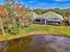 Aerial view showcasing home's location near the lake at 4914 Lakescene Pl, Sarasota, FL 34243