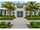 Community clubhouse with landscaping and palm trees at 4947 Surfside Cir, Bradenton, FL 34211