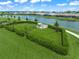 Fenced dog park with seating and water feature at 4947 Surfside Cir, Bradenton, FL 34211