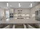 Spacious kitchen island with a large quartz countertop at 4947 Surfside Cir, Bradenton, FL 34211