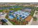 Aerial view of community pickleball courts and surrounding landscape at 4947 Surfside Cir, Bradenton, FL 34211