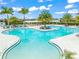 Community resort-style pool with lounge chairs and cabanas at 4947 Surfside Cir, Bradenton, FL 34211