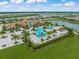 Aerial view of resort-style pool with multiple pools and lounge areas at 4947 Surfside Cir, Bradenton, FL 34211