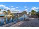 The dock and boat lift offer easy access to waterfront living and boating adventures at 5207 Bimini Dr, Bradenton, FL 34210