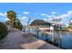 This property features a private dock and boat lift on a scenic waterway at 5207 Bimini Dr, Bradenton, FL 34210
