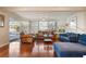 Living room featuring hardwood floors, an open floor plan, and natural light at 5207 Bimini Dr, Bradenton, FL 34210