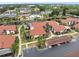 Aerial view of condo community, showing buildings and a pool at 5400 34Th W St # D12, Bradenton, FL 34210