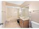 Clean bathroom with updated vanity and a bathtub shower combo at 5400 34Th W St # D12, Bradenton, FL 34210