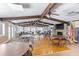 Spacious community room with tables and a fireplace at 5400 34Th W St # D12, Bradenton, FL 34210