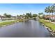 Community features a pond, shuffleboard, and lush landscaping at 5400 34Th W St # D12, Bradenton, FL 34210
