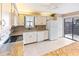 Updated kitchen featuring white cabinets and a convenient pass-through to dining at 5400 34Th W St # D12, Bradenton, FL 34210