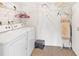Laundry room with washer, dryer, and shelving at 5400 34Th W St # D12, Bradenton, FL 34210