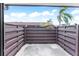 Private patio with wood privacy fence and plenty of sunlight at 5400 34Th W St # D12, Bradenton, FL 34210