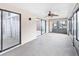 Sunroom with sliding glass doors and fan at 5400 34Th W St # D12, Bradenton, FL 34210