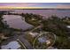 Elevated view showcasing home's waterfront location and neighborhood at 543 Hillcrest Dr, Bradenton, FL 34209