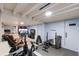Finished basement features home gym area, exercise equipment and sitting area at 543 Hillcrest Dr, Bradenton, FL 34209