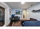 Bedroom with a desk, sitting area, and access to a deck at 543 Hillcrest Dr, Bradenton, FL 34209