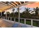Deck with lounge chairs and scenic sunset view at 543 Hillcrest Dr, Bradenton, FL 34209