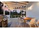 Relaxing deck features a dining area and grill at 543 Hillcrest Dr, Bradenton, FL 34209