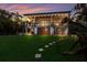 Elevated home with covered porch, walkway, and lush lawn at 543 Hillcrest Dr, Bradenton, FL 34209