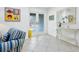 Bright and airy entryway with double doors and tasteful decor at 5560 Shadow Lawn Dr, Sarasota, FL 34242