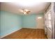 Bright living room with light walls, hardwood floors, and a ceiling fan at 5606 20Th S Ave, Gulfport, FL 33707