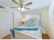 Guest bedroom with white bed frame and coastal decor at 6033 34Th W St # 120, Bradenton, FL 34210