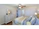 Bright bedroom with a comfortable bed and white dresser at 6033 34Th W St # 120, Bradenton, FL 34210