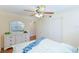 Bedroom with a white dresser and coastal decor at 6033 34Th W St # 120, Bradenton, FL 34210