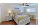 Main bedroom with a queen bed and dresser at 6033 34Th W St # 120, Bradenton, FL 34210