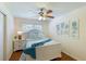 Guest bedroom with white bed frame and coastal decor at 6033 34Th W St # 120, Bradenton, FL 34210