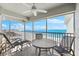 Screened balcony overlooking the ocean and beach at 6312 Midnight Pass Rd # 702S, Sarasota, FL 34242