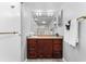 Bathroom features a dark wood vanity and granite countertop at 6312 Midnight Pass Rd # 702S, Sarasota, FL 34242