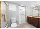 Bathroom with granite vanity, updated fixtures, and a shower/tub combo at 6312 Midnight Pass Rd # 702S, Sarasota, FL 34242