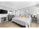 Bright bedroom with a king-size bed and ocean view at 6312 Midnight Pass Rd # 702S, Sarasota, FL 34242