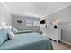 Guest bedroom with two twin beds and white dresser at 6312 Midnight Pass Rd # 702S, Sarasota, FL 34242