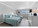 Guest bedroom with two twin beds and white dresser at 6312 Midnight Pass Rd # 702S, Sarasota, FL 34242