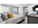 Main bedroom with a king-size bed and ocean views at 6312 Midnight Pass Rd # 702S, Sarasota, FL 34242