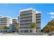 Beachfront building with balconies and ocean view at 6312 Midnight Pass Rd # 702S, Sarasota, FL 34242