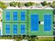 Aerial view of well-maintained tennis and pickleball courts at 6312 Midnight Pass Rd # 702S, Sarasota, FL 34242