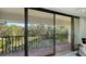 Relaxing balcony with pond and lush landscape views at 6450 Wild Oak Bay Blvd # 238, Bradenton, FL 34210