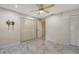 Spacious bedroom with marble-look flooring and built-in closets at 6450 Wild Oak Bay Blvd # 238, Bradenton, FL 34210