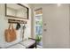 Bright entryway with bench seating and coat hooks at 6450 Wild Oak Bay Blvd # 238, Bradenton, FL 34210